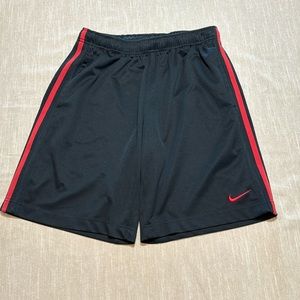 Nike Men’s  black and red basketball shorts. Size small.  Has two front pockets